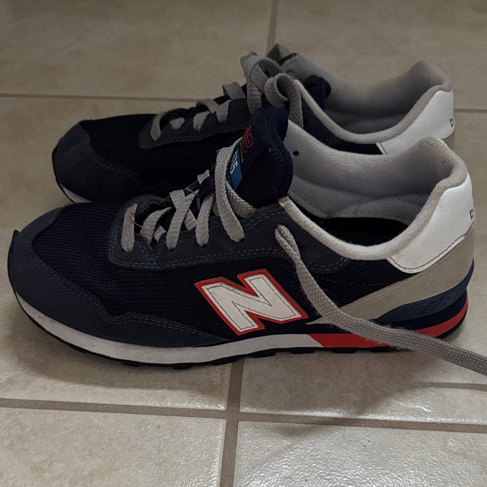 New Balance Dark Blue Sneakers with Red and White Details